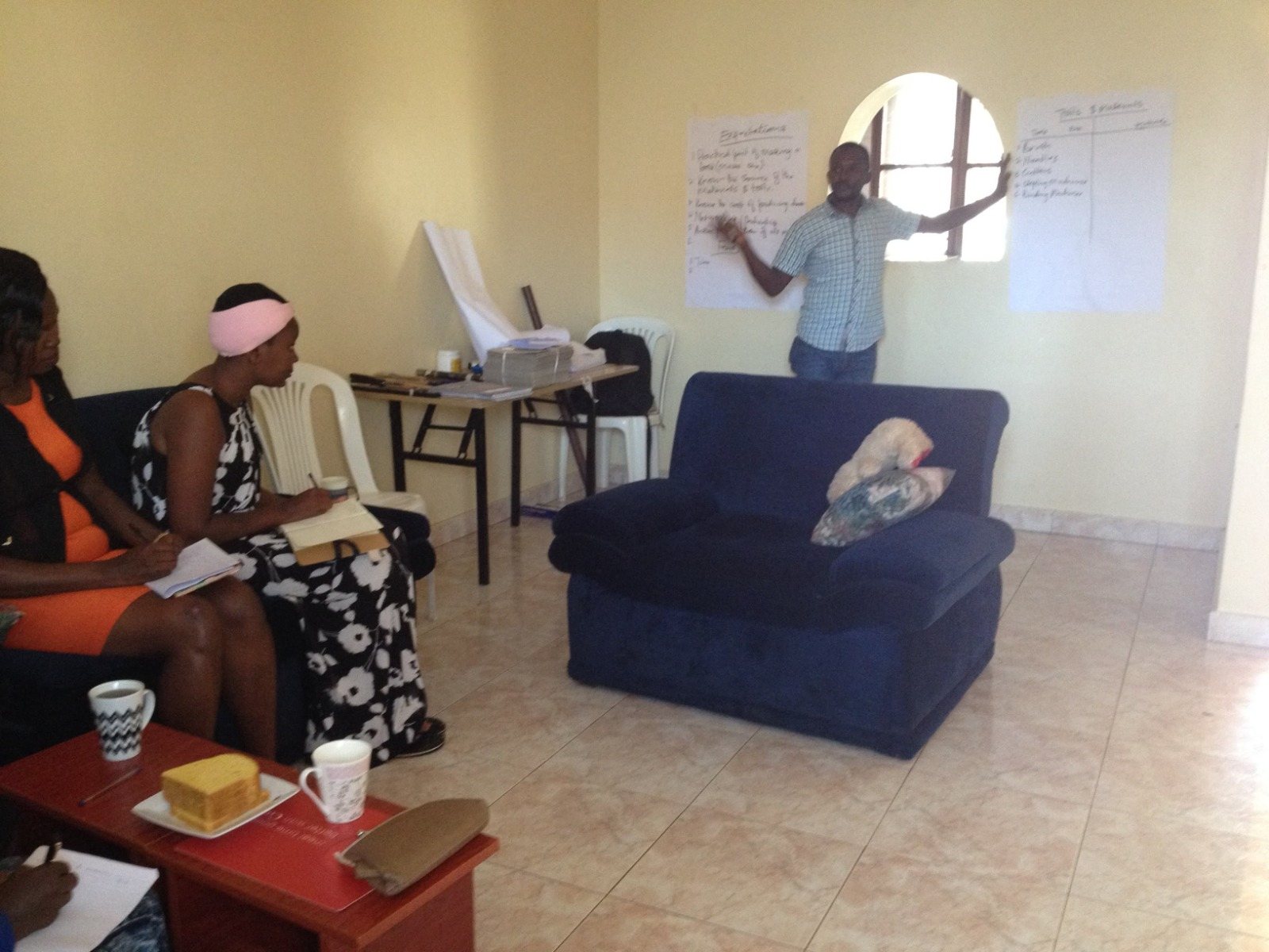 Facilitator and participants during a participatory workshop